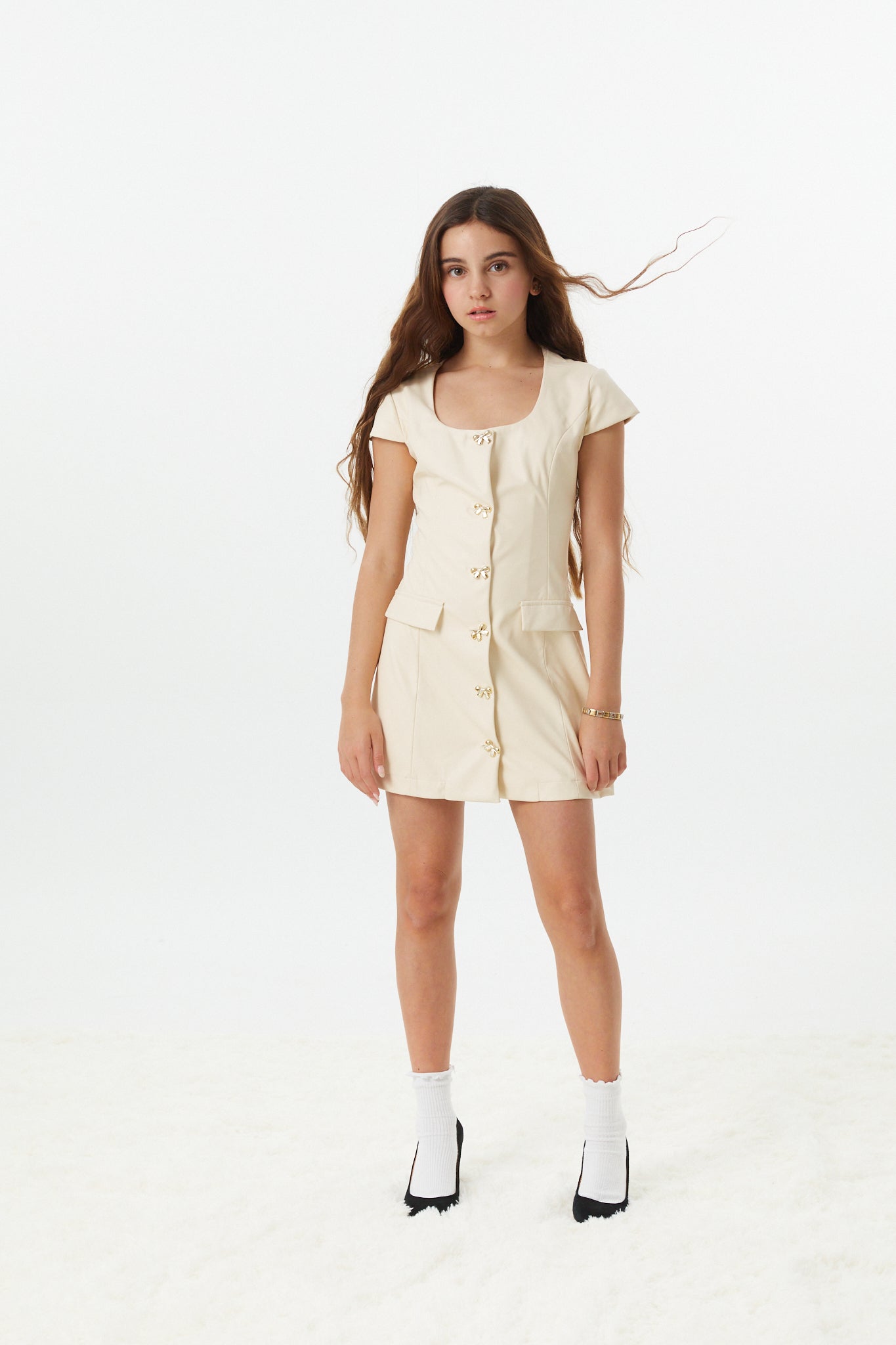 Zoe Cream With Bow Buttons Vegan Leather Cap Sleeve