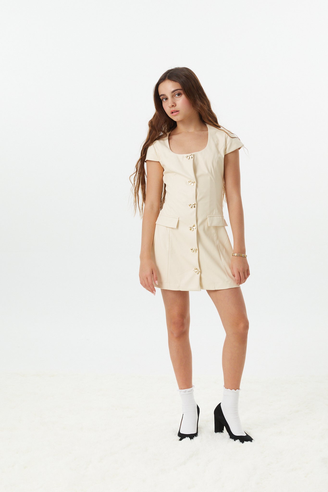 Zoe Cream With Bow Buttons Vegan Leather Cap Sleeve
